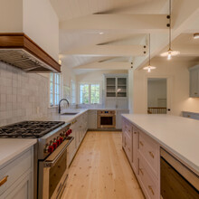 kitchen of extensive renovation transformed an existing c. 1840 Weston home into a warm, refined Vermont retreat