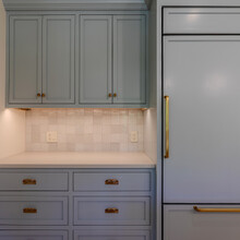 kitchen in an extensive renovation transformed an existing c. 1840 Weston home into a warm, refined Vermont retreat