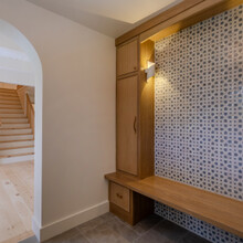 foyer of an extensive renovation transformed an existing c. 1840 Weston home into a warm, refined Vermont retreat