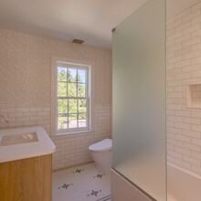 bathroom of an extensive renovation transformed an existing c. 1840 Weston home into a warm, refined Vermont retreat