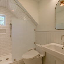 bathroom in an extensive renovation transformed an existing c. 1840 Weston home into a warm, refined Vermont retreat